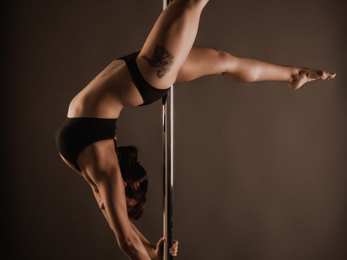 Crescent Moon pole move with split legs